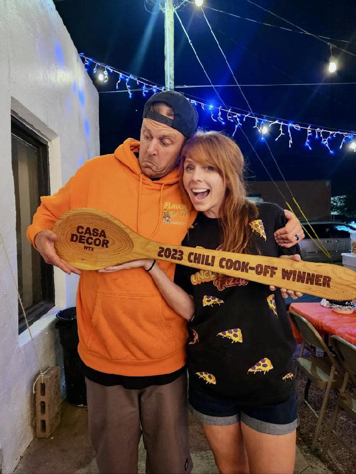 Jonathan and Becca Schiller posing with their well deserved trophy